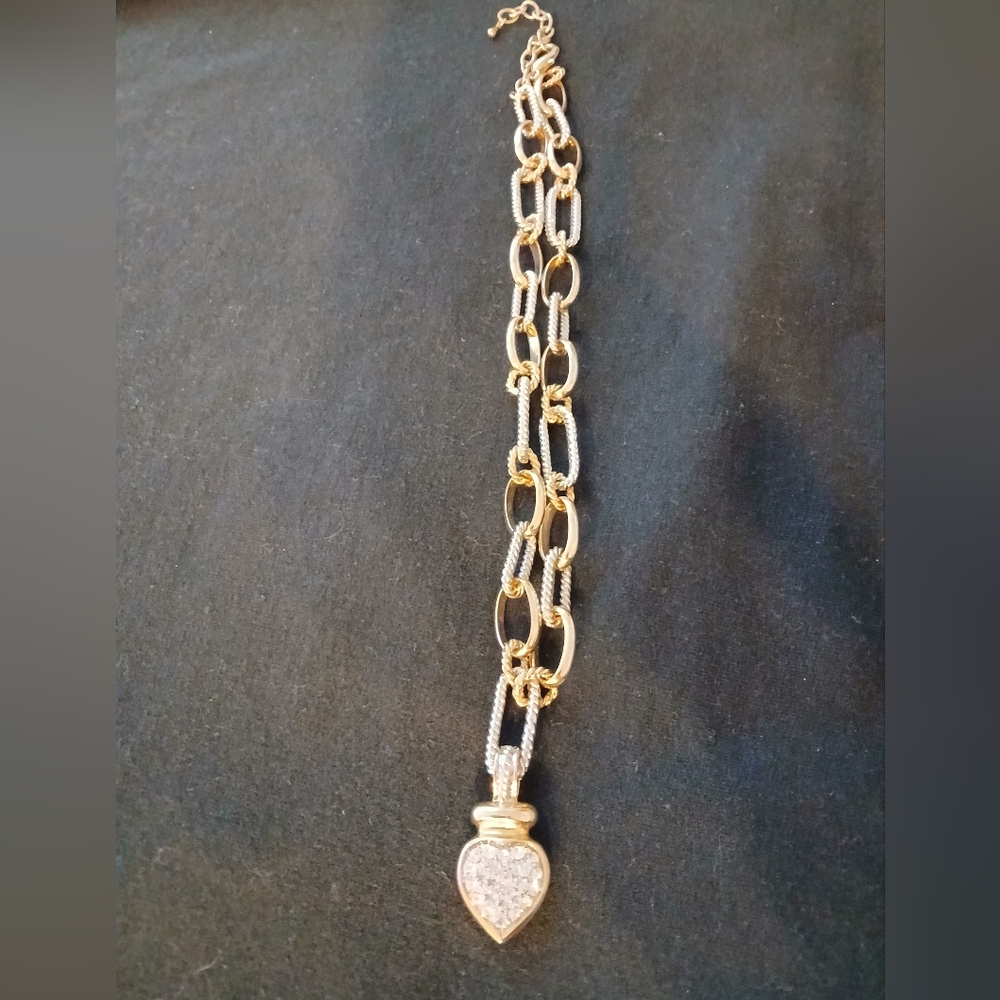 Elegant Gold and Silver Pendant Necklace